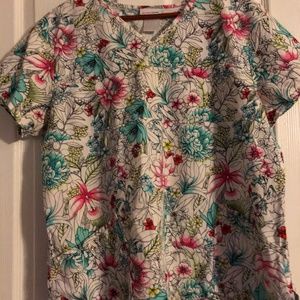 Multi-colored flowered scrub top